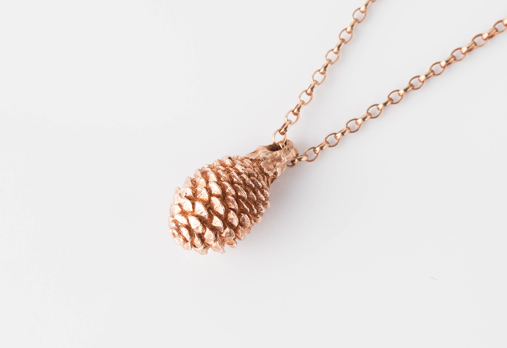 Rose gold plated pine cone